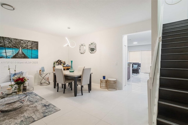 dining room featuring light tile patterned floors