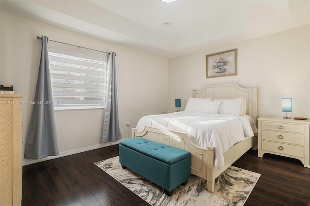 bedroom featuring dark hardwood / wood-style floors