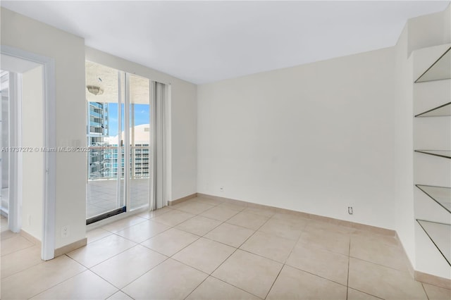 view of tiled spare room