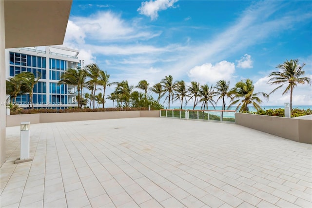 view of patio featuring a water view