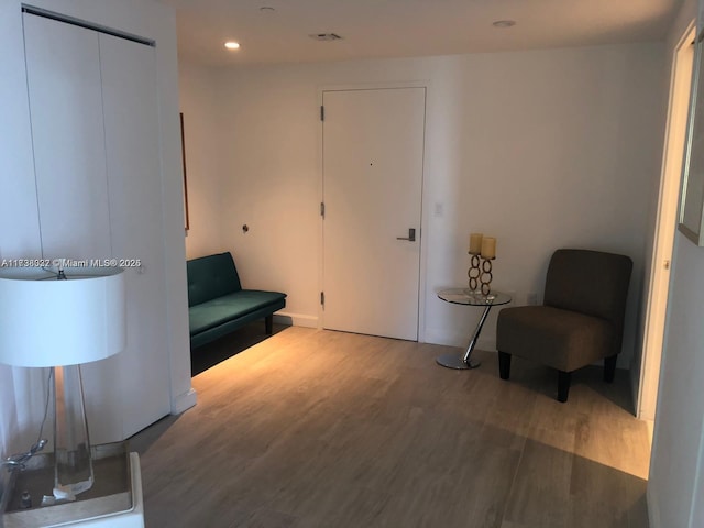 living area featuring hardwood / wood-style flooring