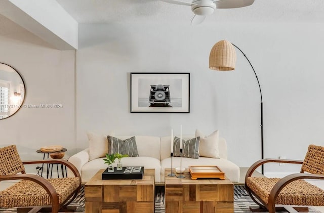 living room featuring ceiling fan