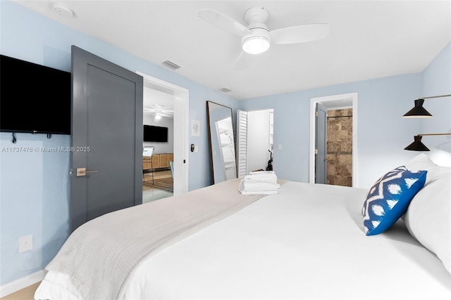 bedroom with visible vents, a ceiling fan, and ensuite bathroom