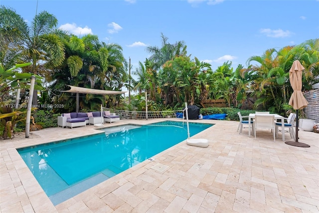 1528 NE 17th Ter, Fort Lauderdale, FL 33304 - view of swimming pool featuring outdoor dining space, a fenced in pool, an outdoor living space, and a patio area