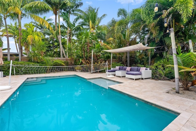 view of swimming pool featuring an outdoor hangout area, a patio, a fenced backyard, and a fenced in pool