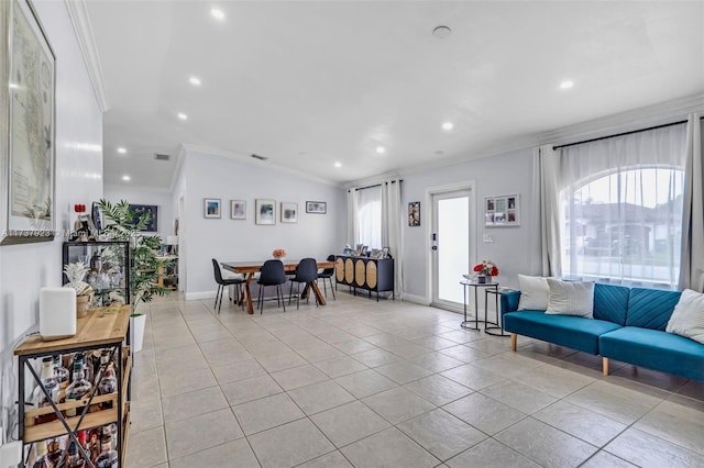 tiled living room with crown molding