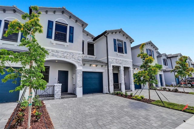 view of front of property with a garage