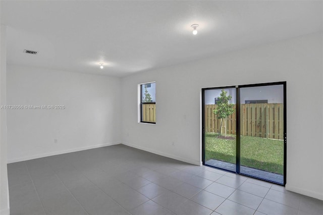 empty room featuring light tile patterned flooring