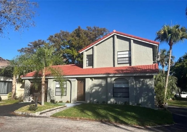 view of front of home with a front yard