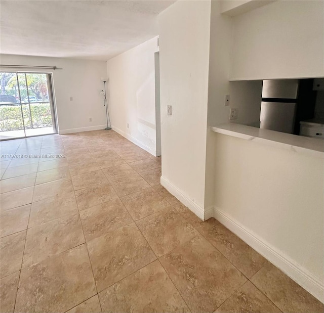 view of tiled empty room