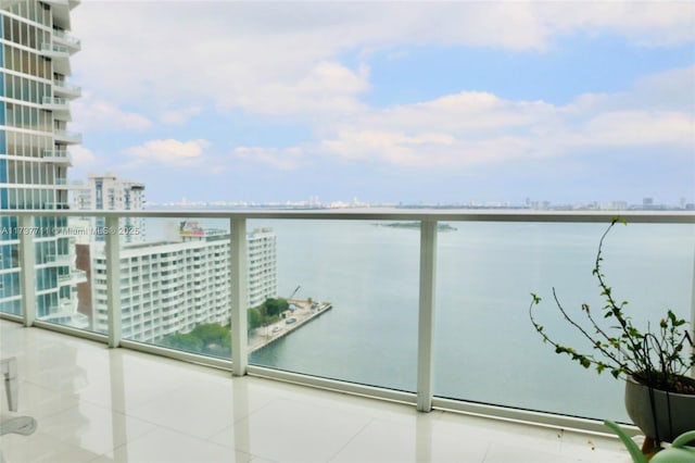 balcony featuring a water view