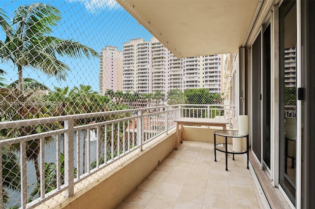 balcony featuring a city view