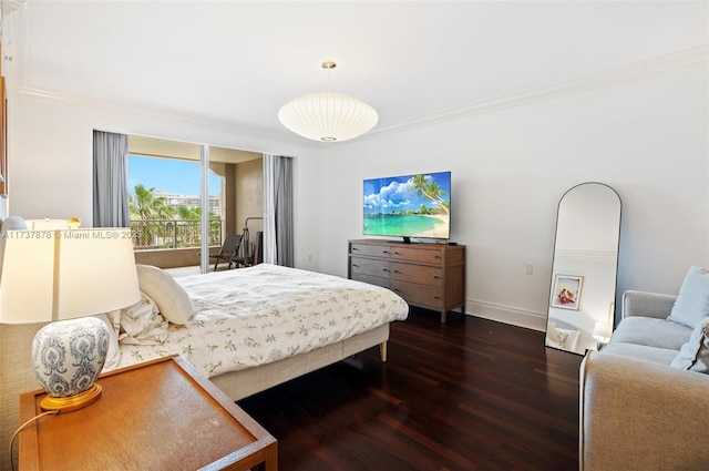 bedroom with dark wood-type flooring, crown molding, and baseboards