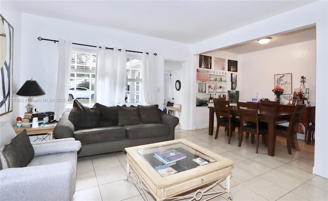 living area with light tile patterned floors