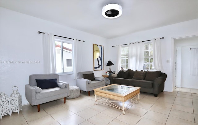 living area with light tile patterned floors