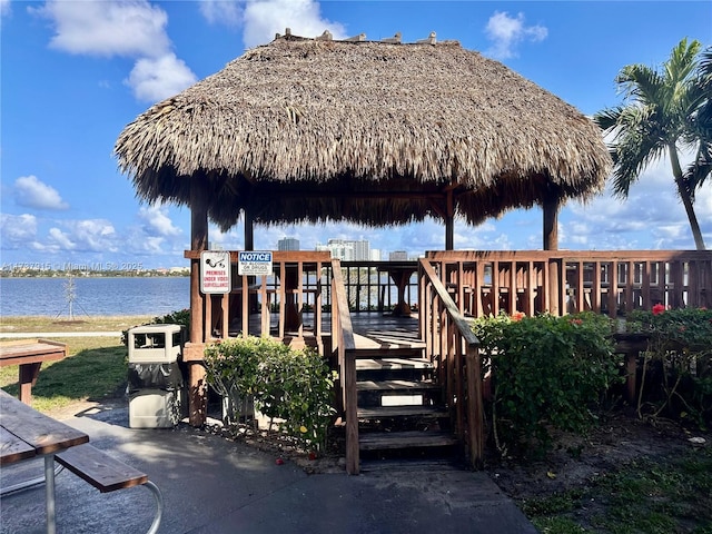 dock area featuring a gazebo and a water view