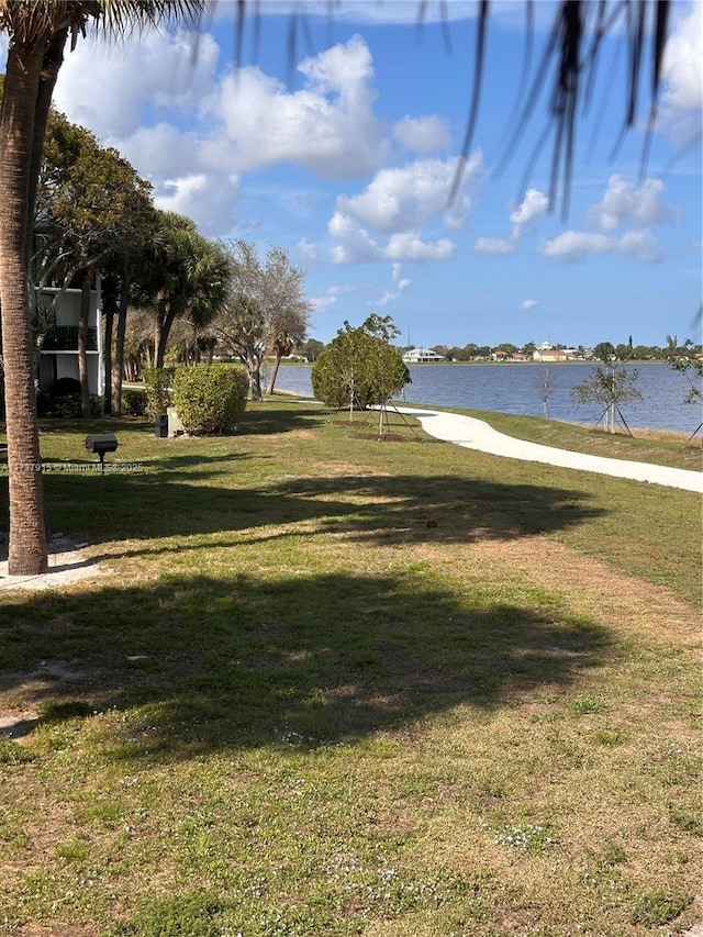 view of yard with a water view