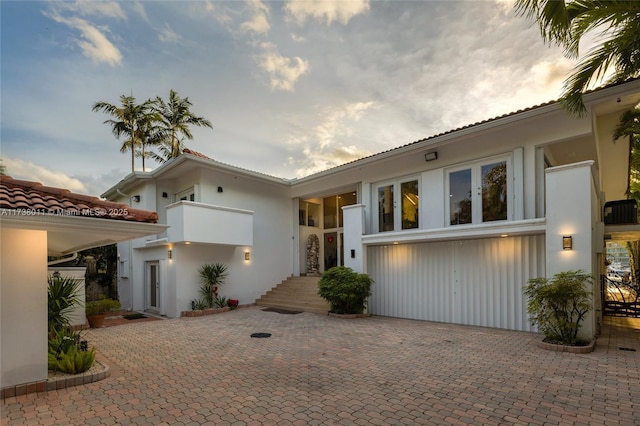 1740 S Bayshore Ln, Miami, FL 33133 - view of front of home with a balcony