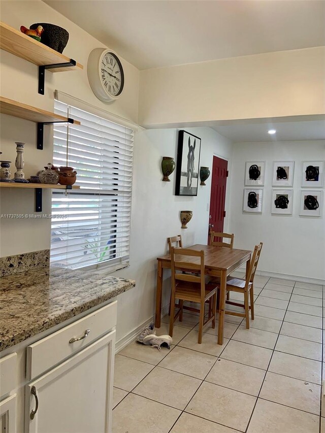 15310 Jackson Dr, Homestead, FL 33033 - dining space featuring light tile patterned floors and healthy amount of natural light