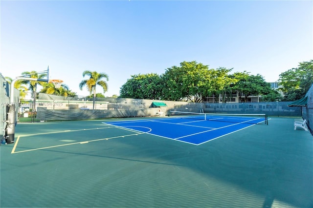 view of sport court featuring fence and community basketball court