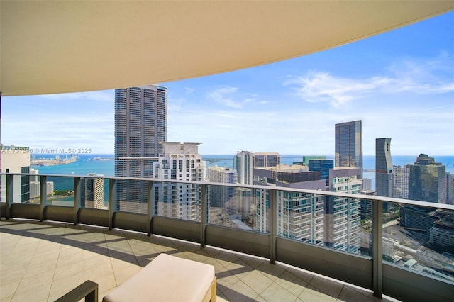 balcony featuring a water view