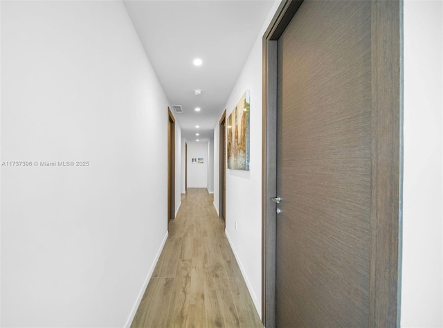 hall featuring light hardwood / wood-style flooring