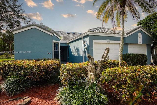 view of front of home featuring a garage