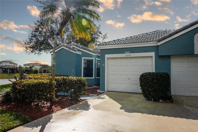 view of front of house with a garage