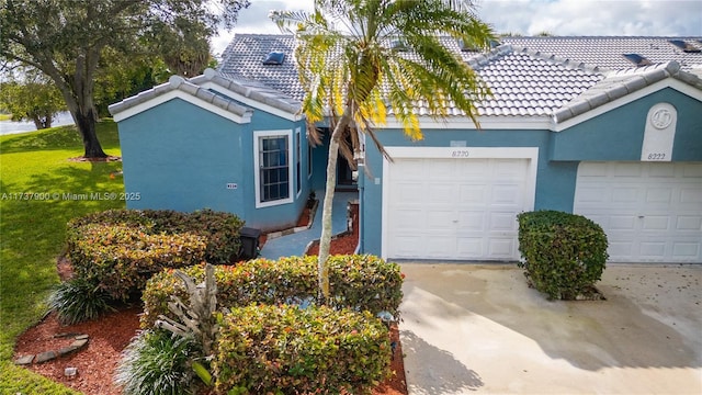 view of front of home with a garage