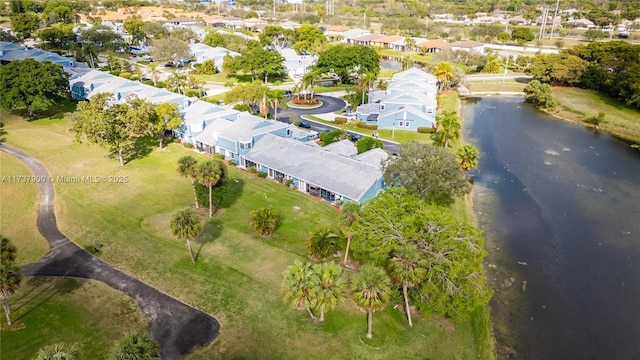 drone / aerial view with a water view