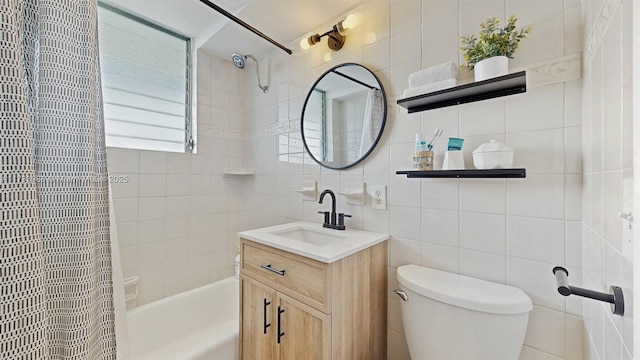 bathroom with backsplash, tile walls, toilet, and vanity