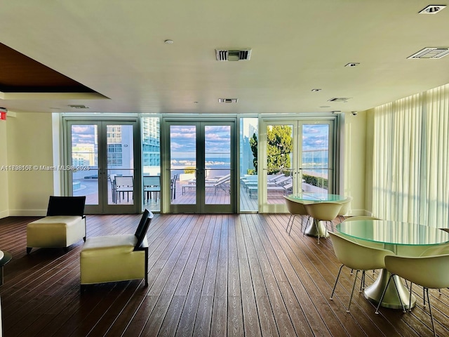 interior space featuring hardwood / wood-style floors and french doors