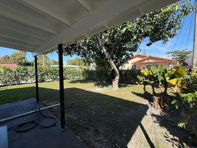 view of yard featuring a fenced backyard and a patio area