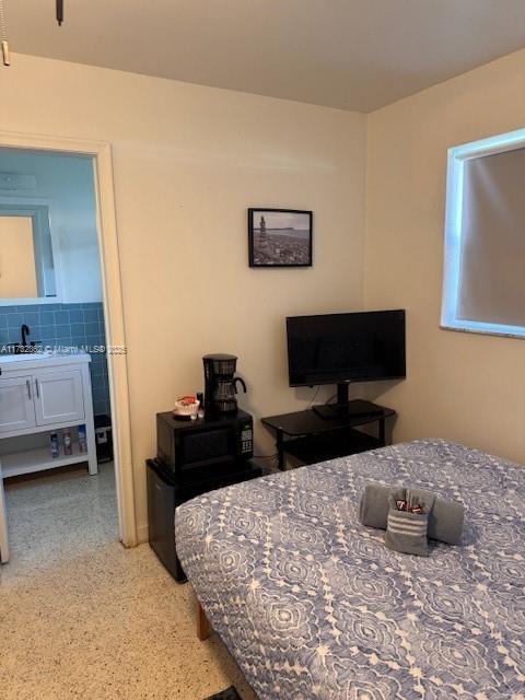 bedroom with ensuite bathroom