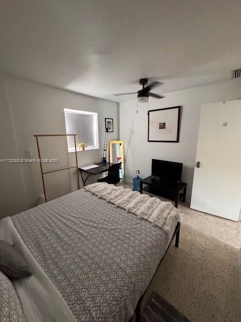 bedroom with a ceiling fan and visible vents
