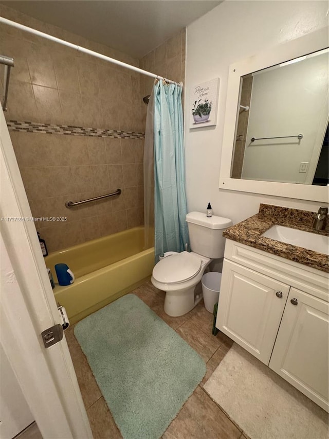 full bathroom featuring vanity, shower / tub combo, and toilet