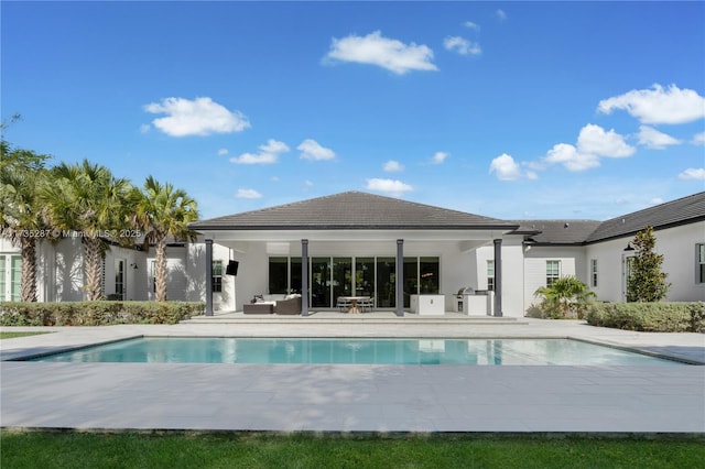 view of swimming pool with a patio area