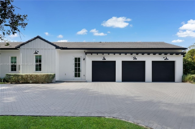 view of front of home with a garage