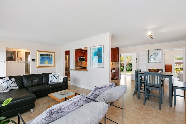 living room with crown molding, plenty of natural light, and light tile patterned flooring