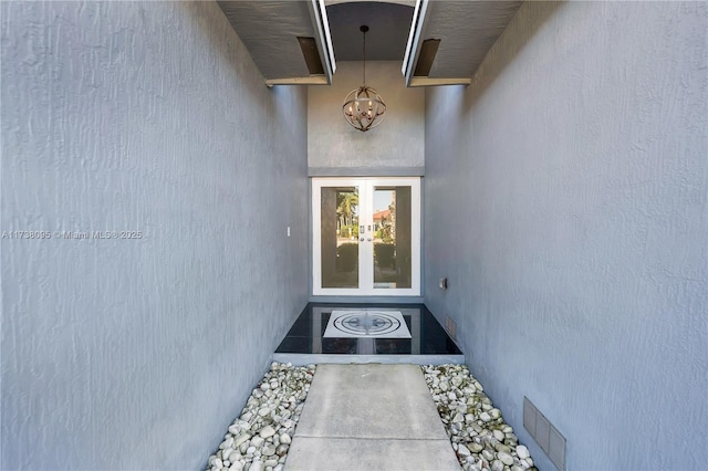 doorway to property with french doors