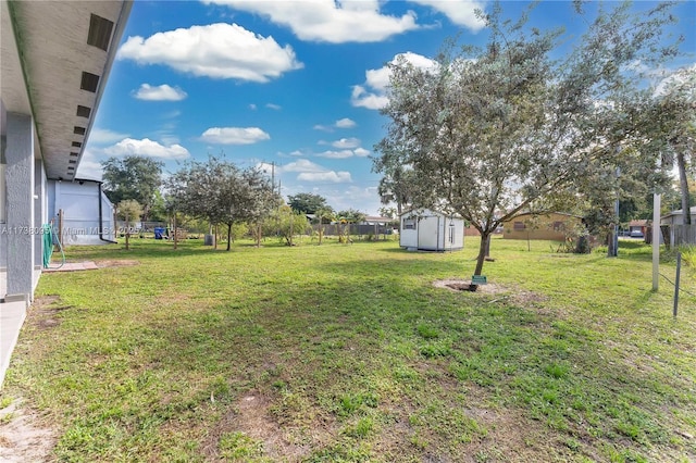 view of yard with a shed