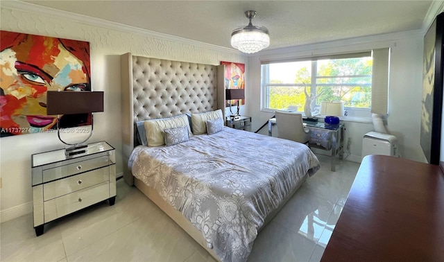 bedroom with an inviting chandelier and ornamental molding