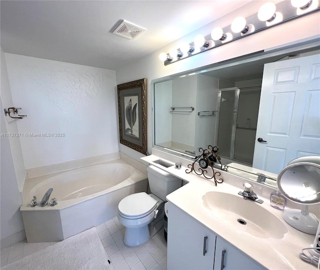 full bathroom featuring vanity, tile patterned floors, shower with separate bathtub, and toilet