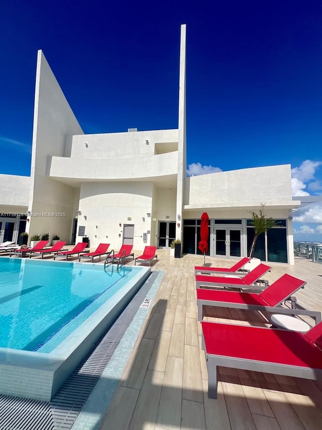 view of pool featuring a patio area