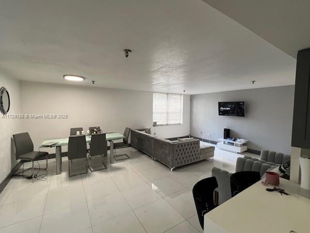 living room with light tile patterned flooring