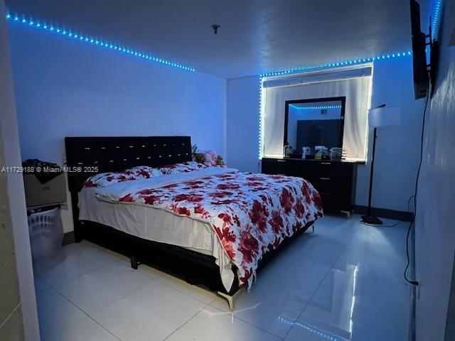 bedroom with tile patterned flooring