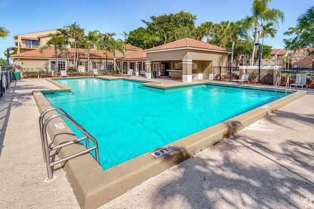 view of swimming pool featuring a gazebo and a patio area