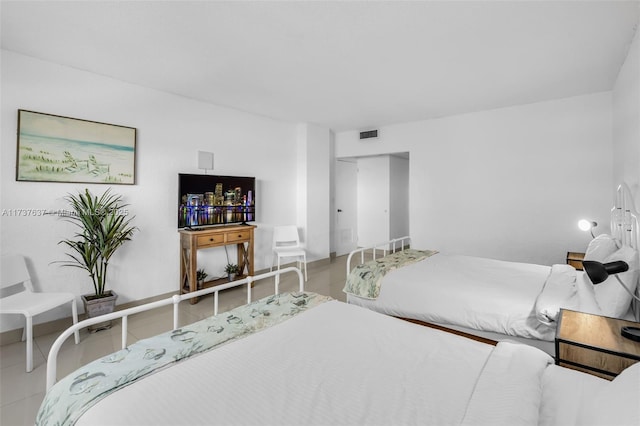 bedroom featuring visible vents