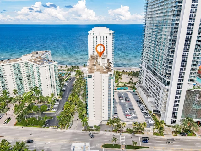 drone / aerial view with a water view and a view of city