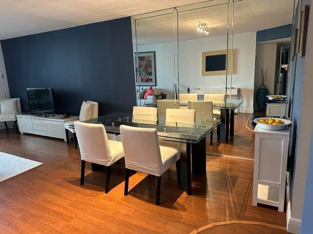2750 NE 183rd St Unit 1401, Aventura, FL 33160 - dining space with hardwood / wood-style floors